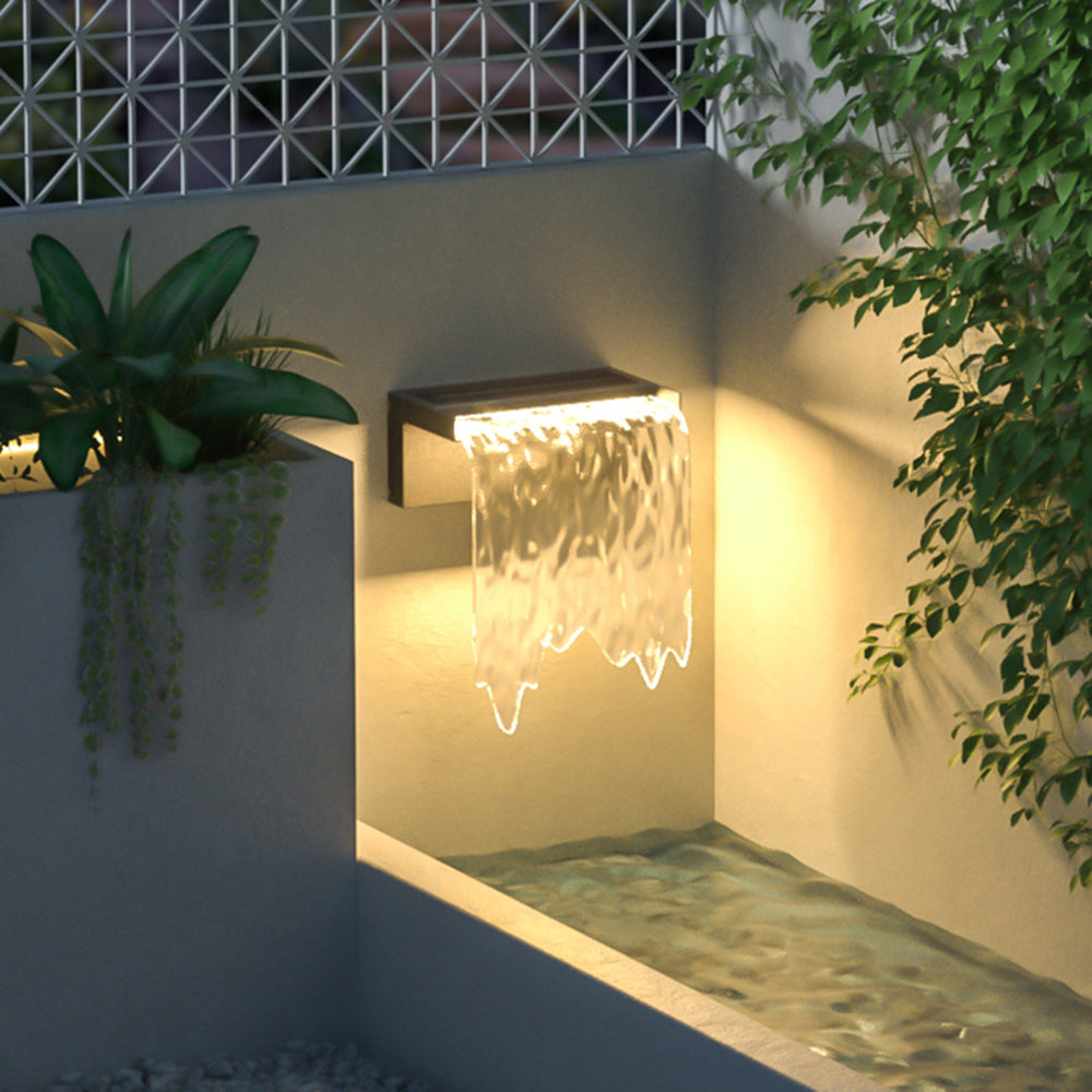 Isaac Modern Minimalist Water Texture Metal/Acrylic Solar Waterproof Outdoor Wall Lamp, Black